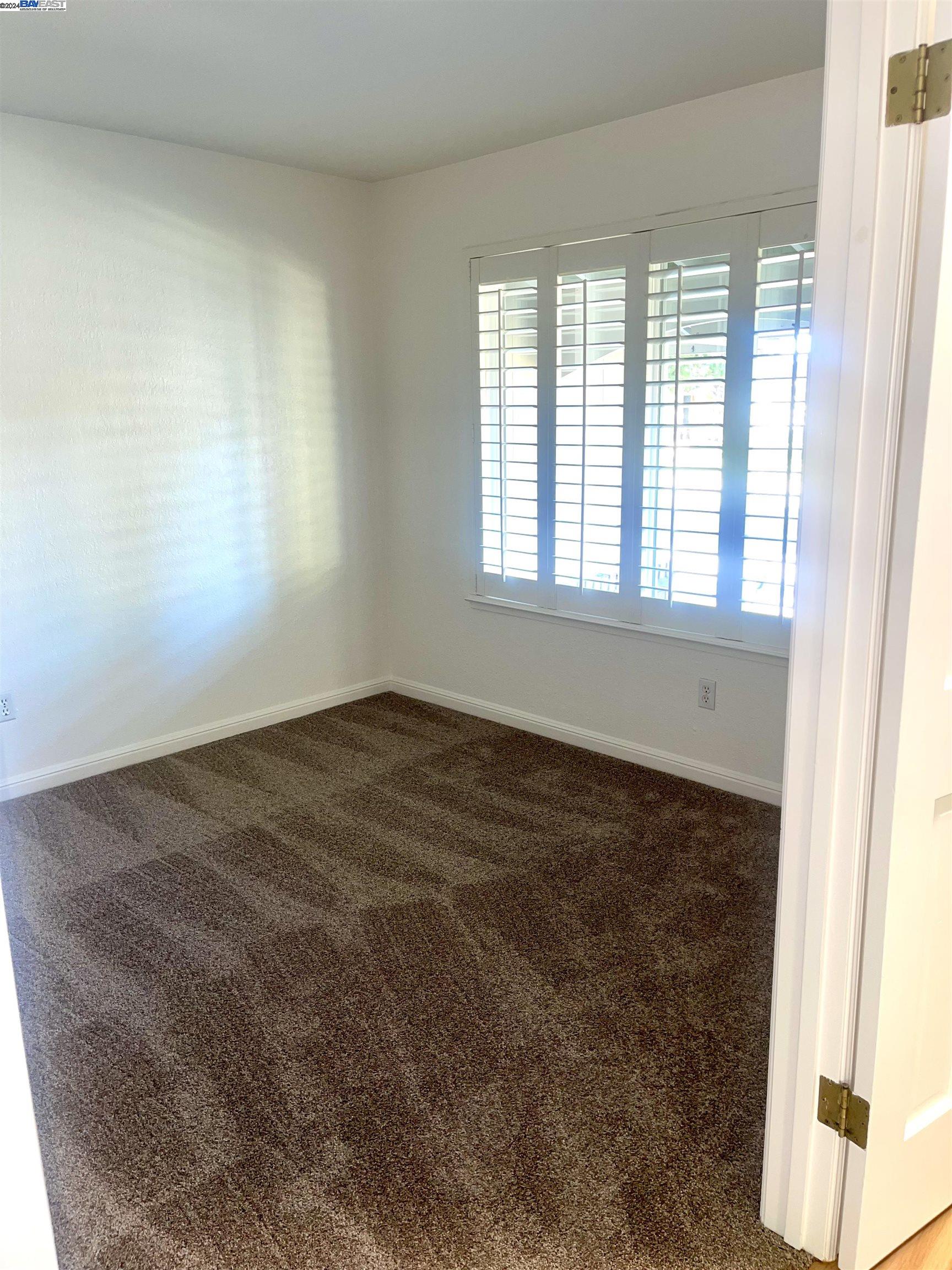 1361 Hudson Way Livermore, CA 94550 - Photo 6 of 23 an empty room with a window