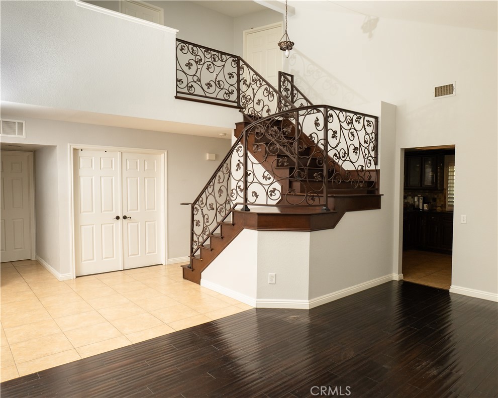 2831 Carma Court Riverside, CA 92503 - Photo 4 of 20 a view of entryway and hall with wooden floor