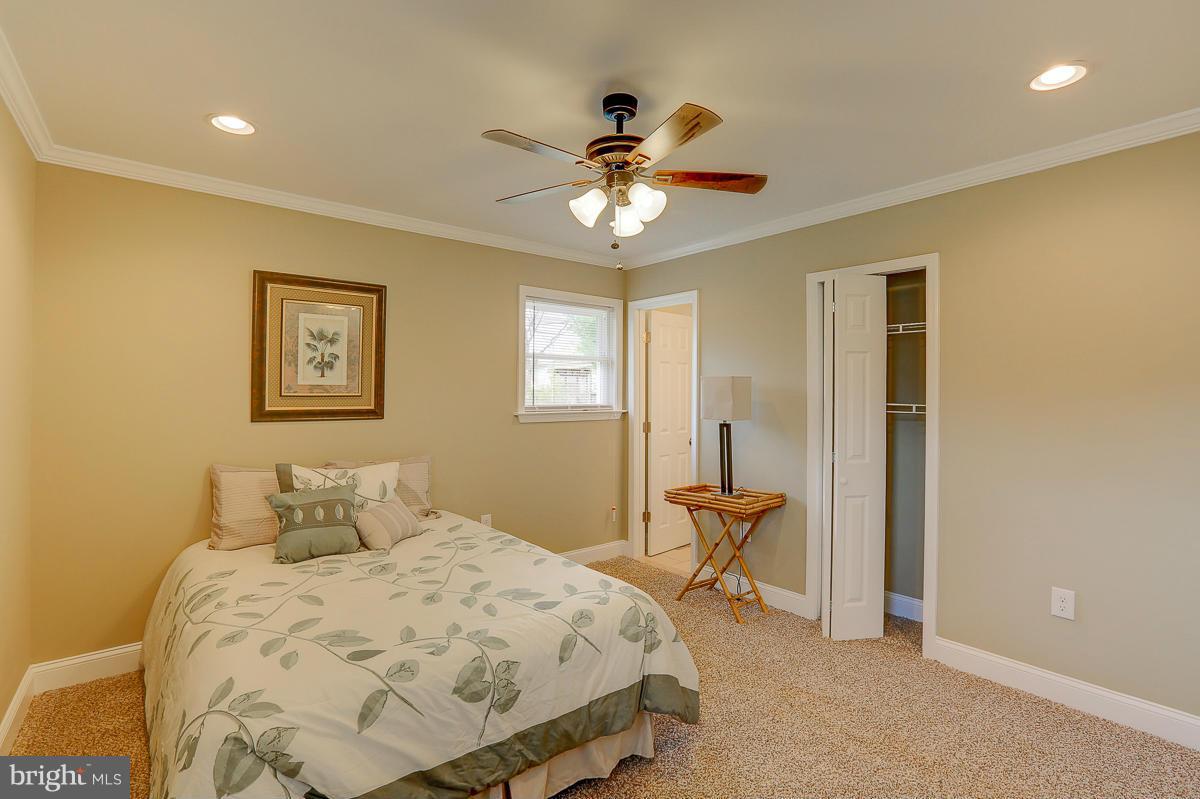 144 Embleton Road Owings Mills, MD 21117 - Photo 12 of 26 a bedroom with a bed and window