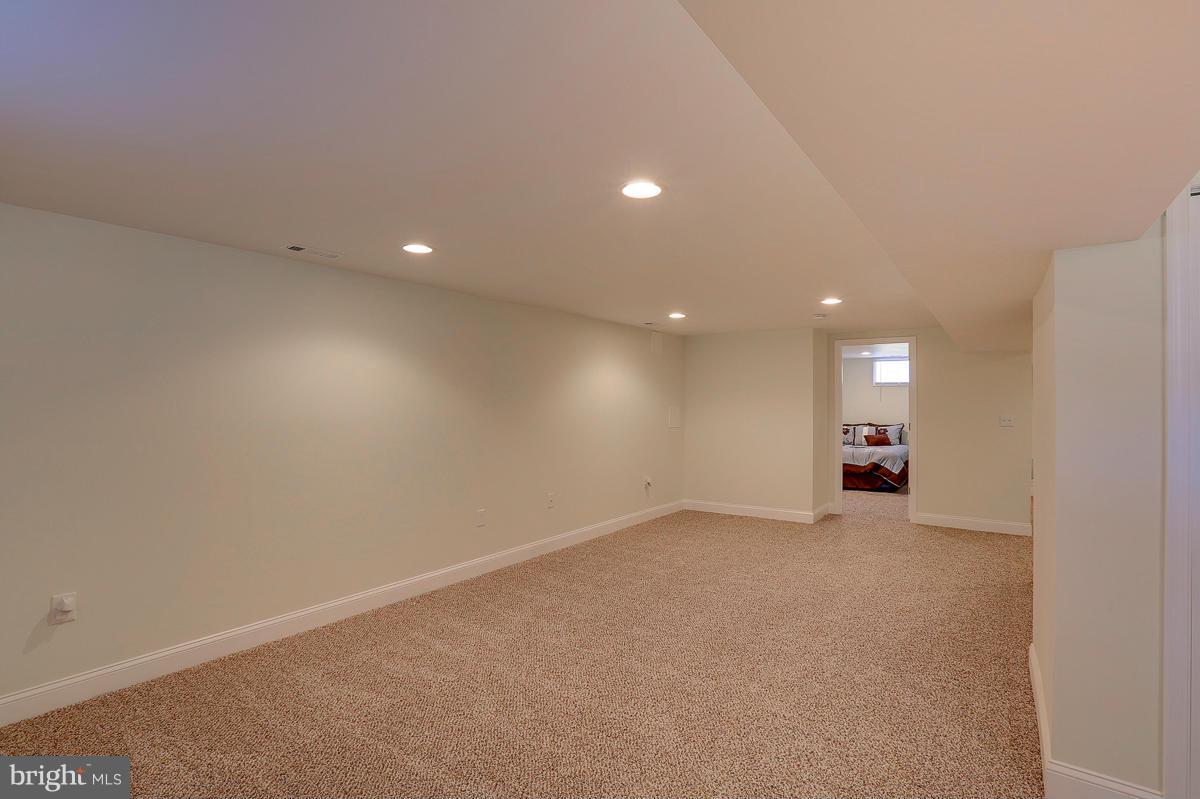 144 Embleton Road Owings Mills, MD 21117 - Photo 19 of 26 a view of an empty room with a window