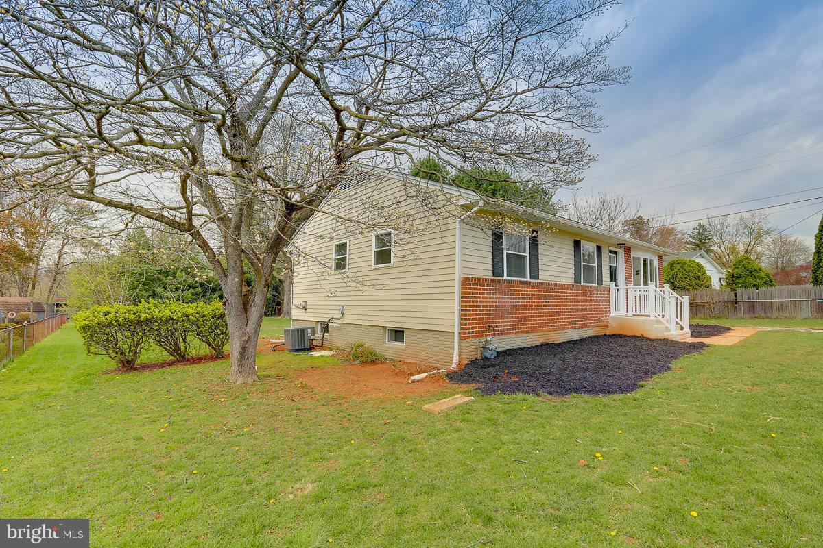 144 Embleton Road Owings Mills, MD 21117 - Photo 24 of 26 a view of a house with a yard