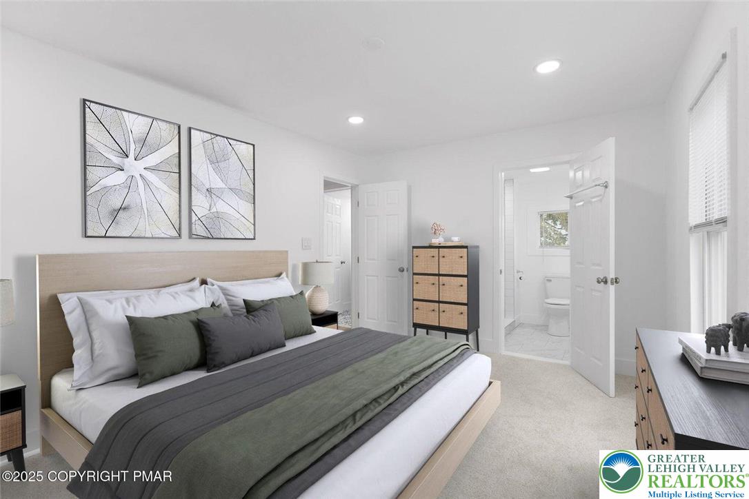 210 Fowler Street Berwick, PA 18603 - Photo 15 of 24 a bedroom with a bed and a couch