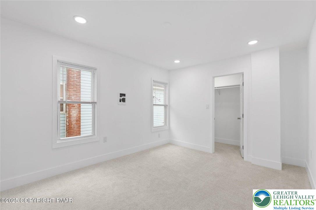 210 Fowler Street Berwick, PA 18603 - Photo 18 of 24 an empty room with windows