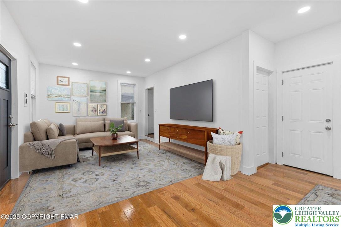 210 Fowler Street Berwick, PA 18603 - Photo 5 of 24 a living room with furniture and a flat screen tv