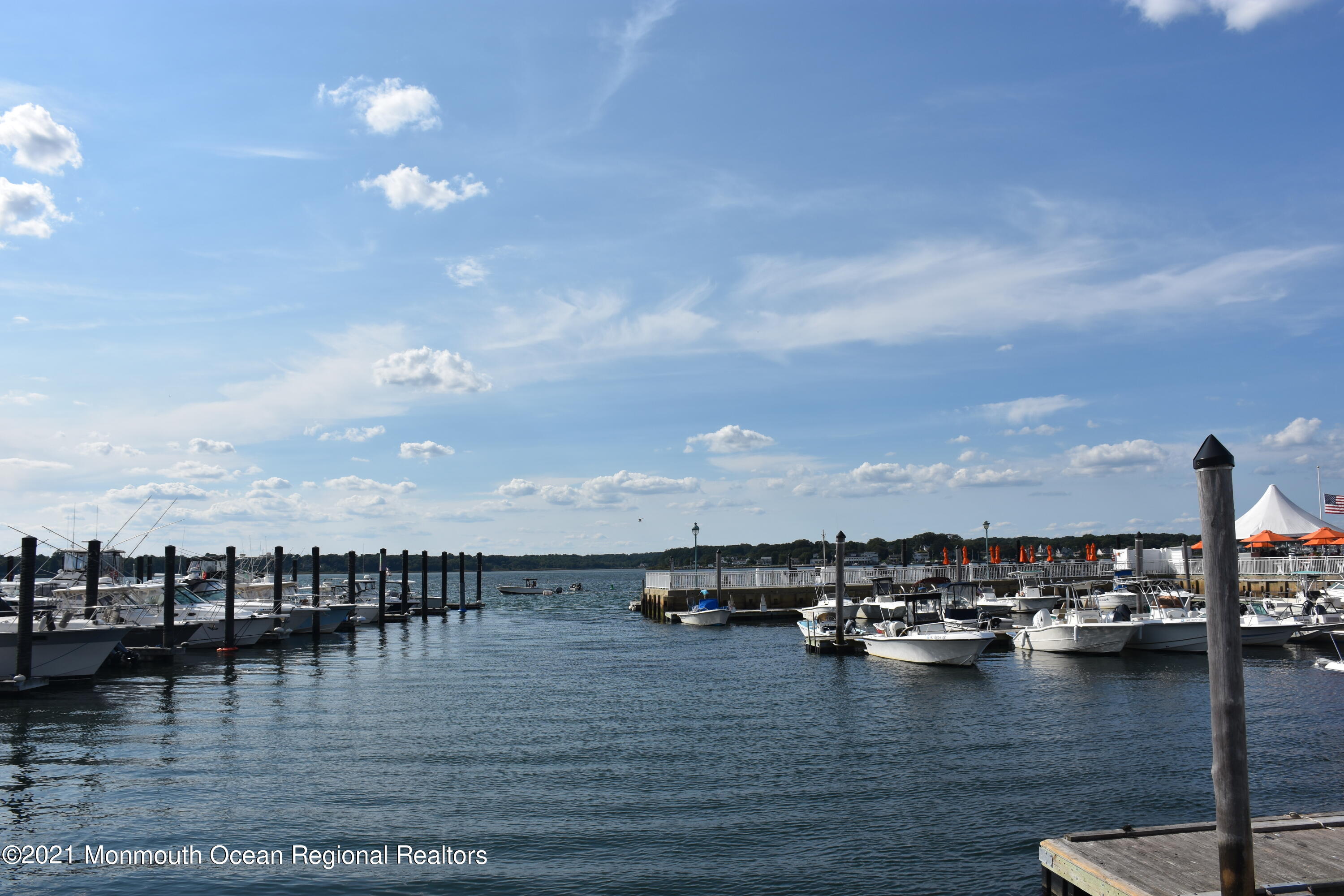 1000 River Road, Unit 3J Belmar, NJ 07719 - Photo 17 of 19 a view of ocean with boats