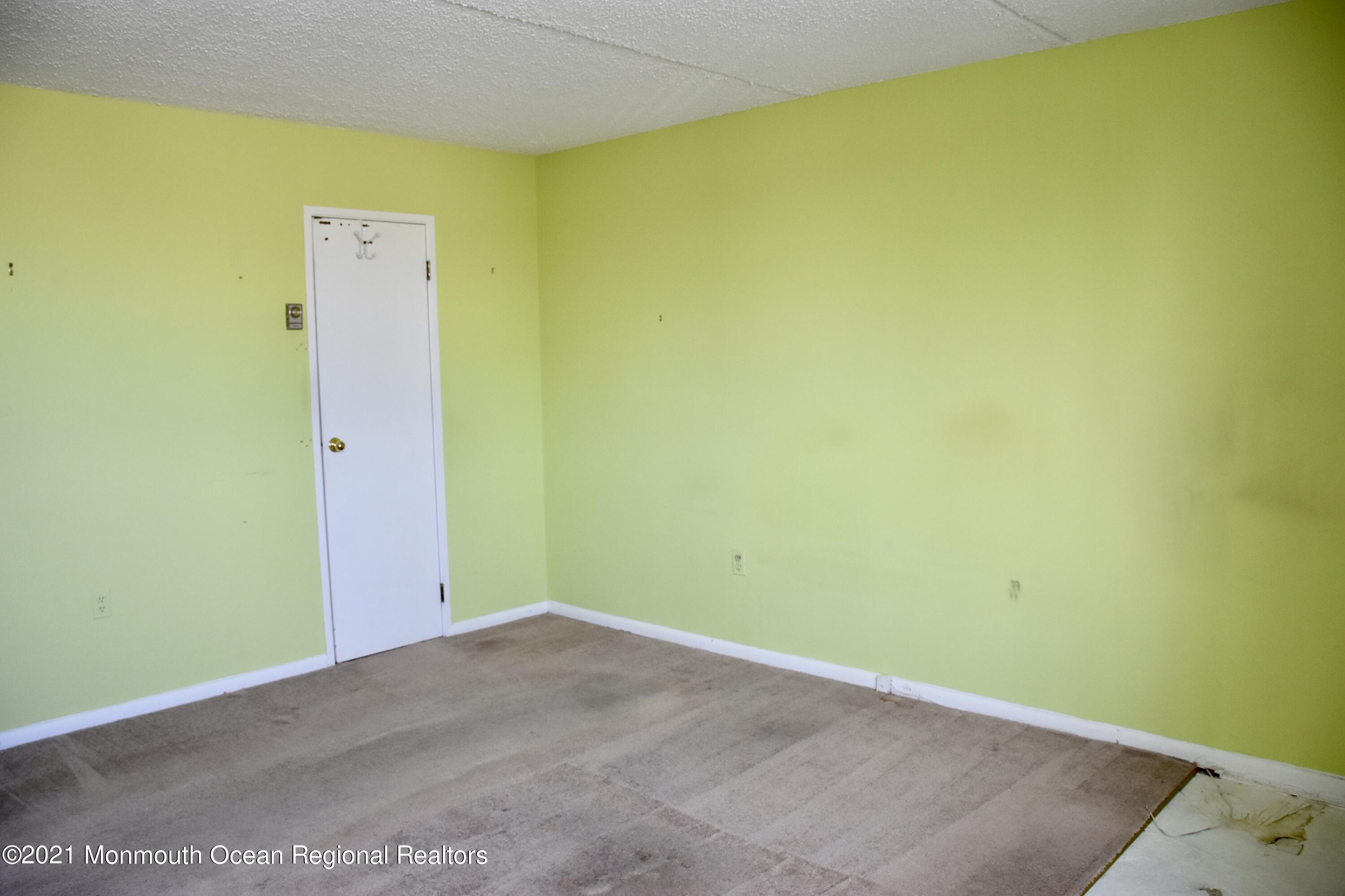 1000 River Road, Unit 3J Belmar, NJ 07719 - Photo 7 of 19 a view of a big room with windows