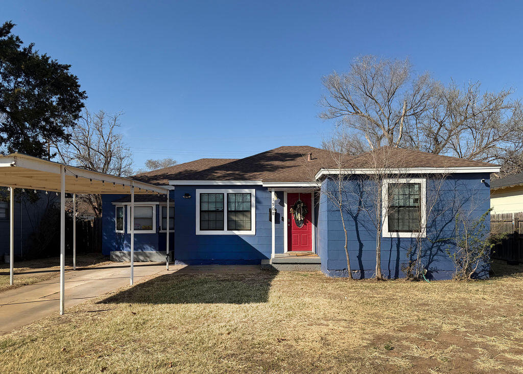 1908 47th Street Lubbock, TX 79412 - Photo 1 of 21 a view of a house with a backyard and porch