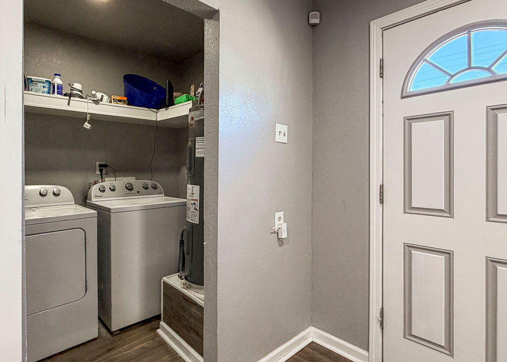 1908 47th Street Lubbock, TX 79412 - Photo 18 of 21 a utility room with dryer and washer