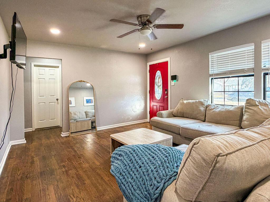 1908 47th Street Lubbock, TX 79412 - Photo 4 of 21 a bedroom with furniture and a window