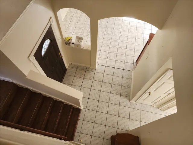 a view of wooden floor in a utility room