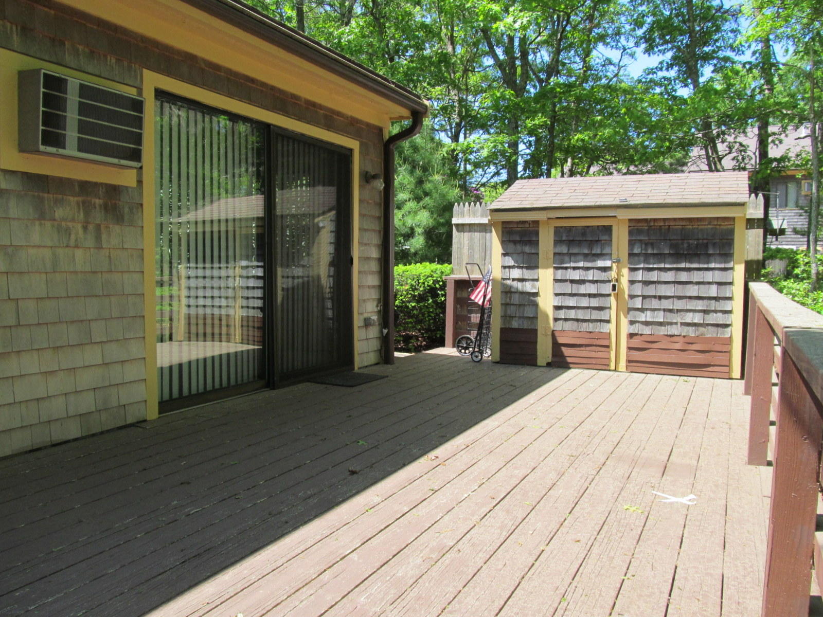 14 Round House Road Bourne, MA 02532 - Photo 15 of 18 a front view of a house with a garden