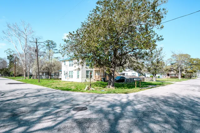 a view of road and trees