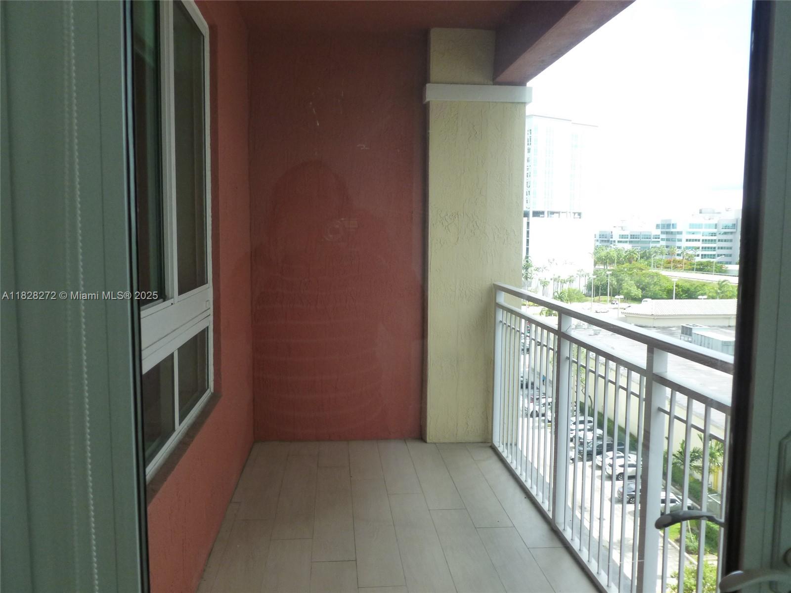 7350 Southwest 89th Street, Unit 808S Miami, FL 33156 - Photo 13 of 13 a view of a porch and garden