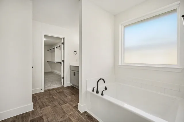 a bathroom with a sink and a bathtub
