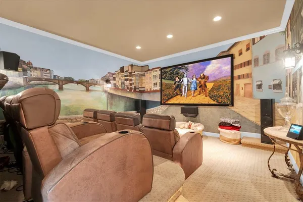 a living room with furniture a window and a rug