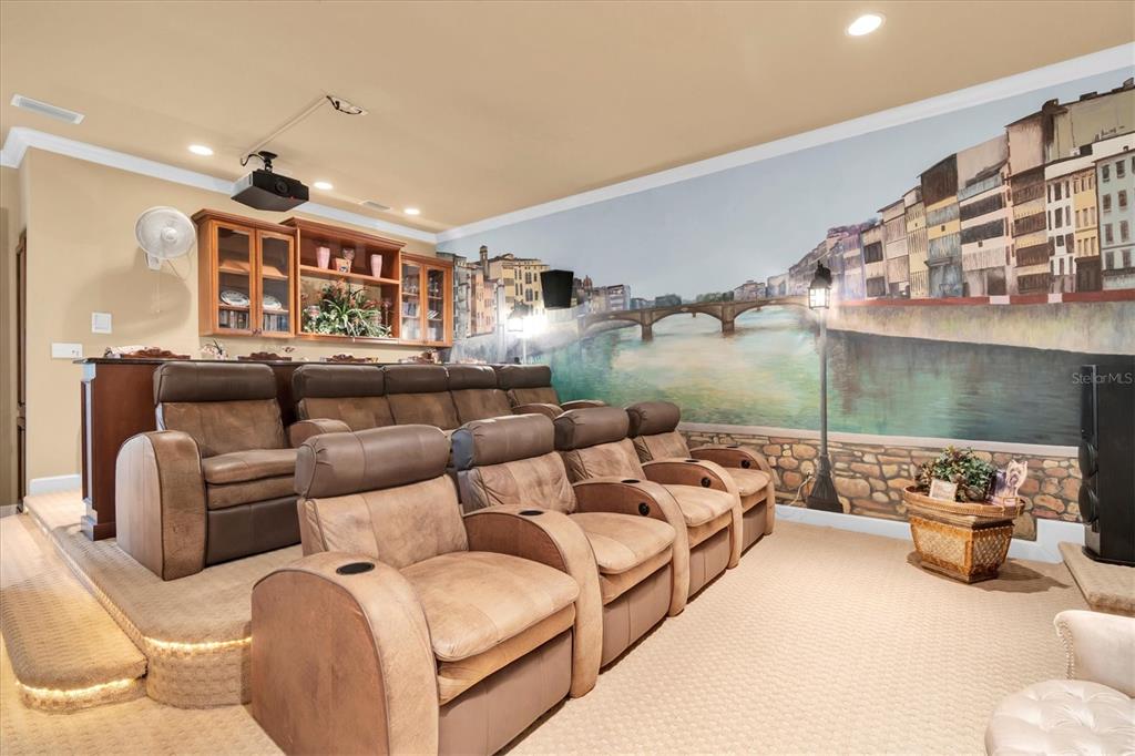 2861 Roehampton Close Tarpon Springs, FL 34688 - Photo 34 of 84 a living room with furniture and a large window