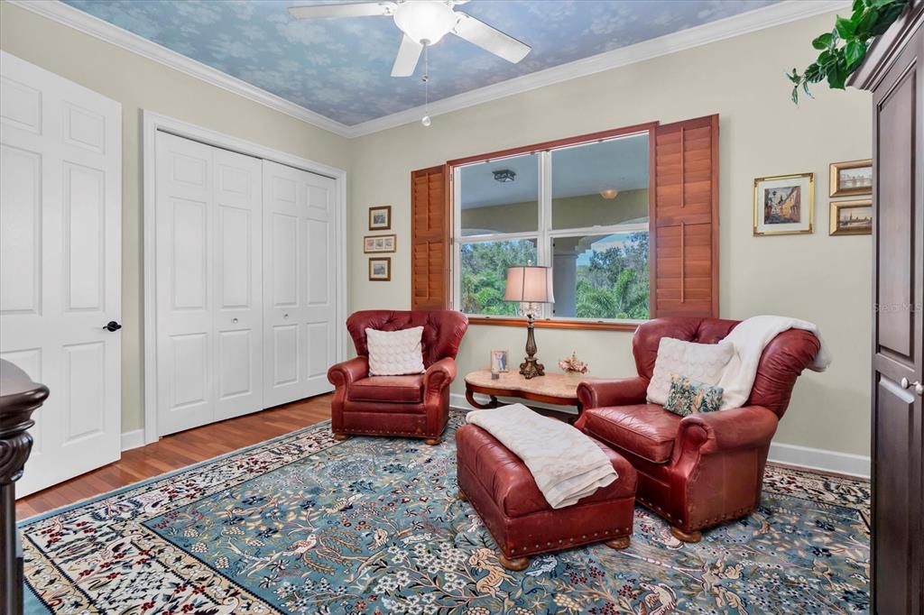 2861 Roehampton Close Tarpon Springs, FL 34688 - Photo 52 of 79 a living room with furniture and a rug
