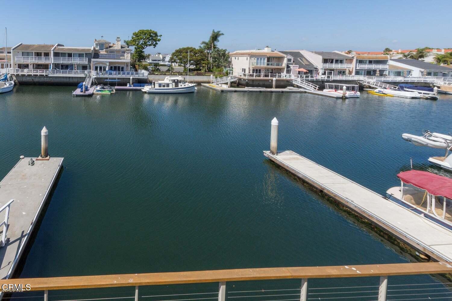 4435 Costa De Oro Oxnard, CA 93035 - Photo 24 of 50 a view of a lake with houses