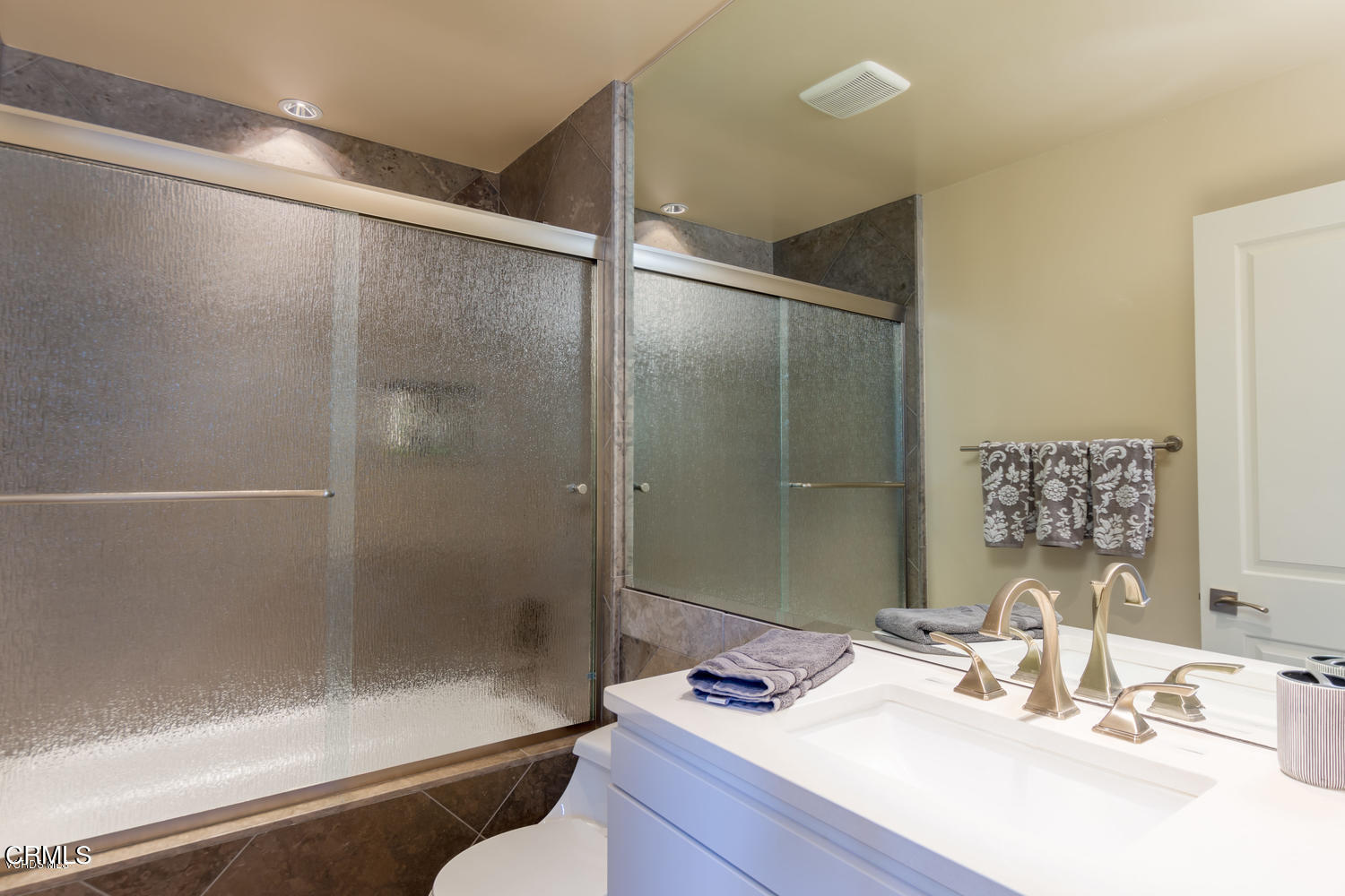 4435 Costa De Oro Oxnard, CA 93035 - Photo 28 of 50 a bathroom with a sink shower and a mirror