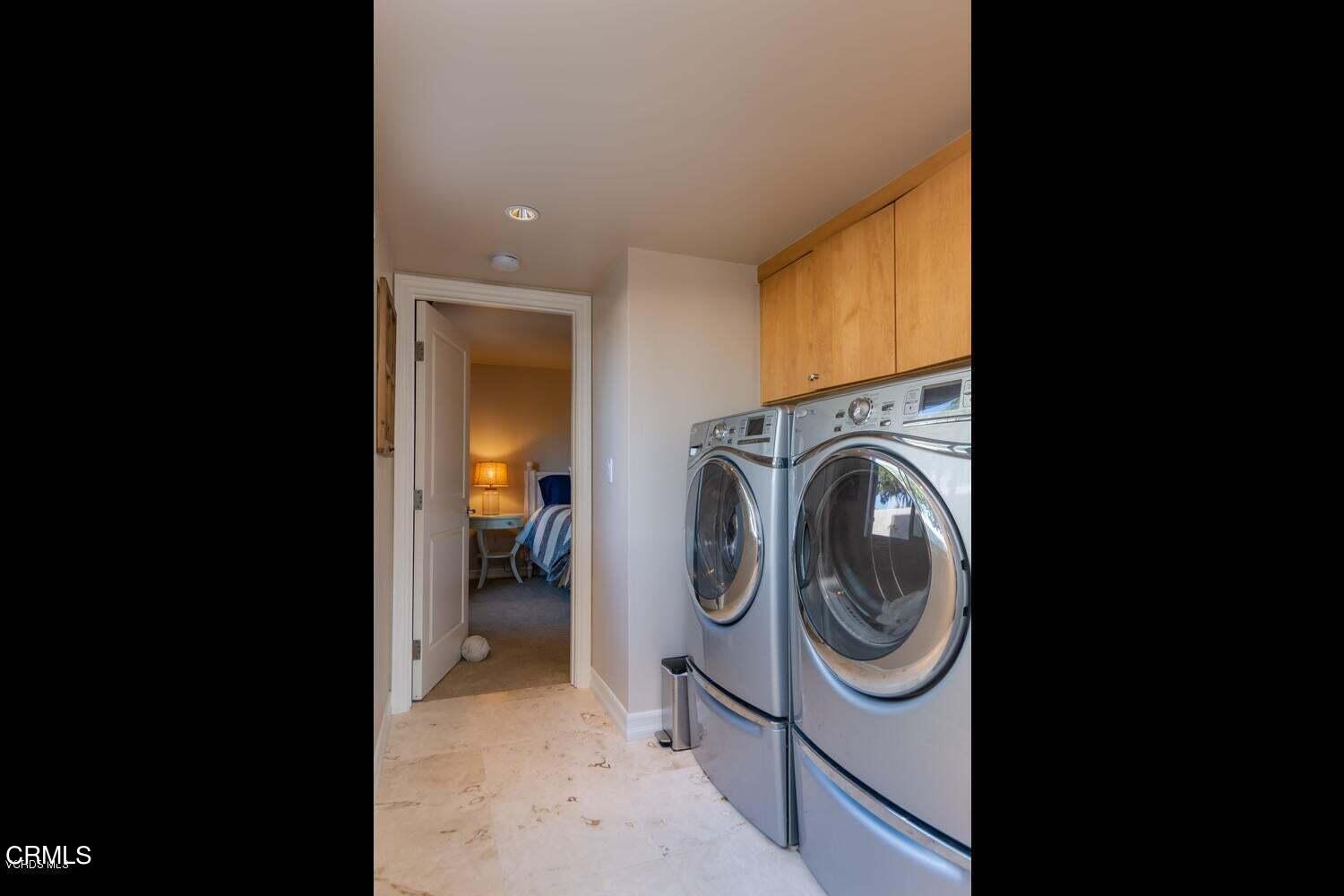 4435 Costa De Oro Oxnard, CA 93035 - Photo 30 of 50 a utility room with dryer and washer