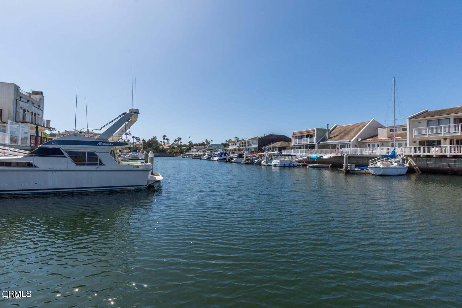 4435 Costa De Oro Oxnard, CA 93035 - Photo 34 of 50 a view of a lake with boats and large trees