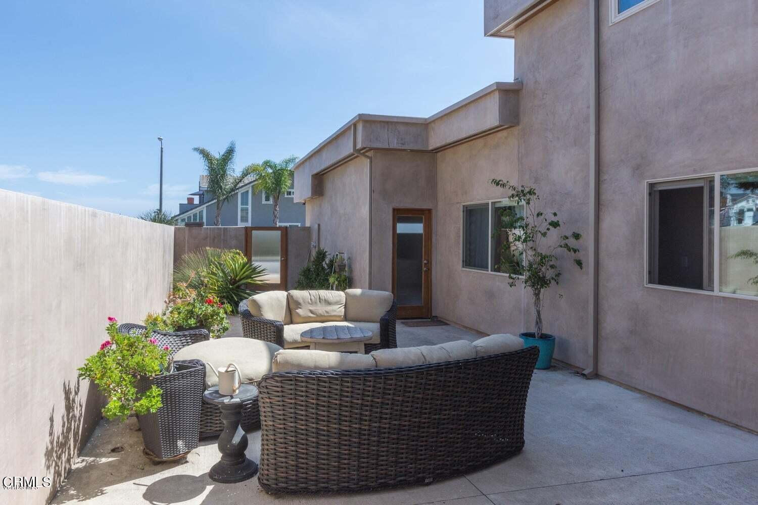 4435 Costa De Oro Oxnard, CA 93035 - Photo 36 of 50 a living room with furniture and a potted plant