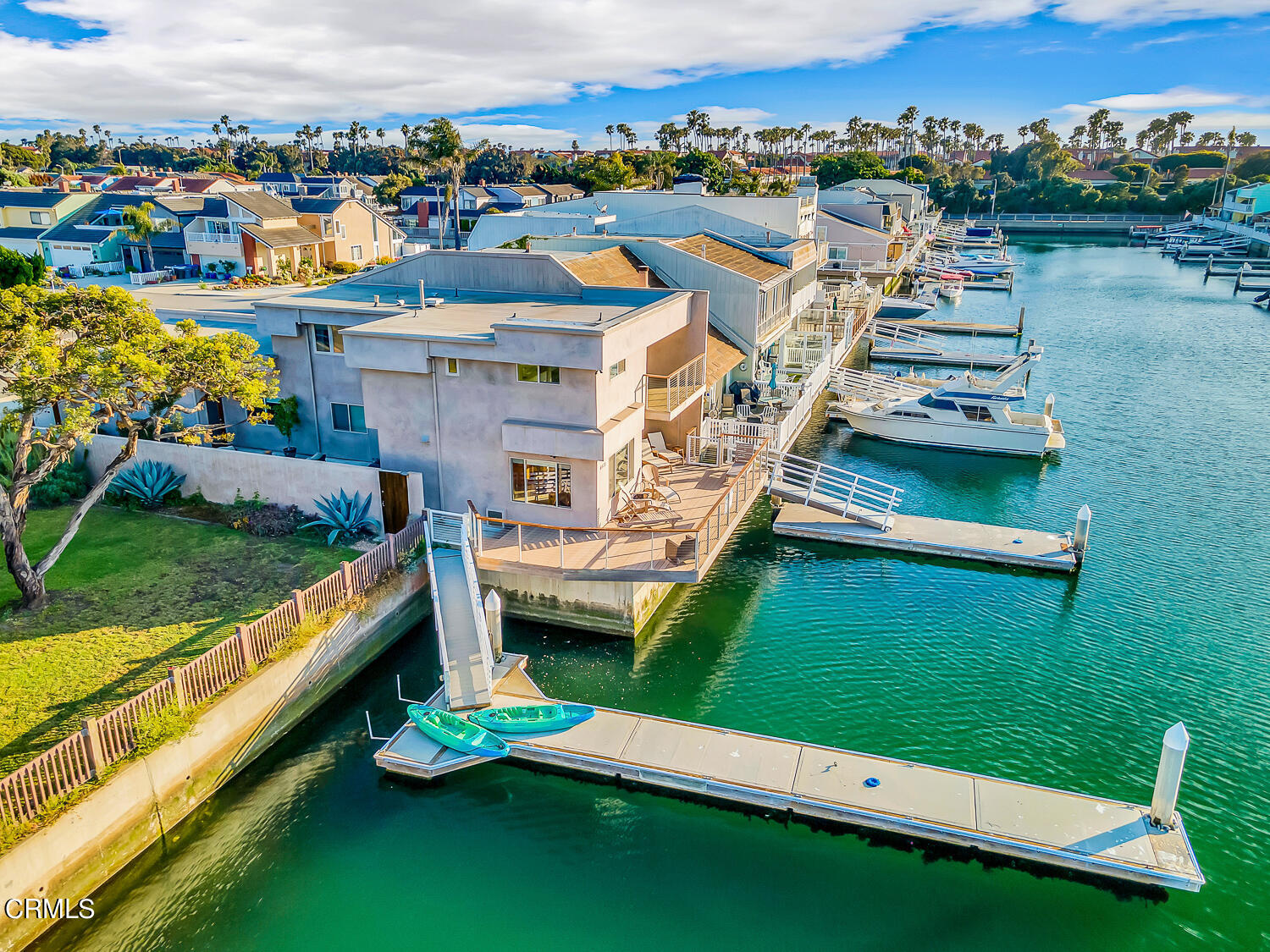 4435 Costa De Oro Oxnard, CA 93035 - Photo 38 of 50 an aerial view of a house with a garden and lake view