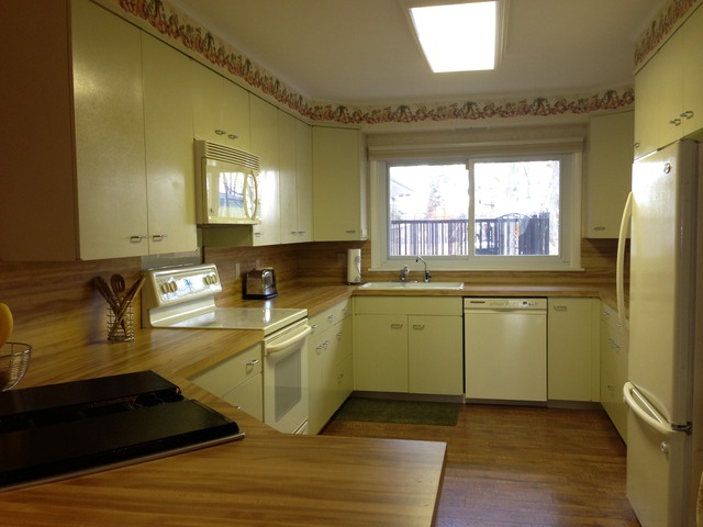 32730 Pleasant Hill Road Genoa, IL 60135 - Photo 2 of 23 a kitchen with sink and window