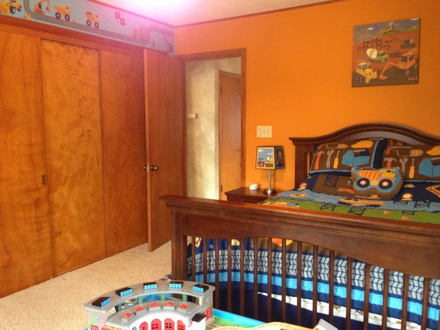 32730 Pleasant Hill Road Genoa, IL 60135 - Photo 11 of 23 a bedroom with a bed and a window