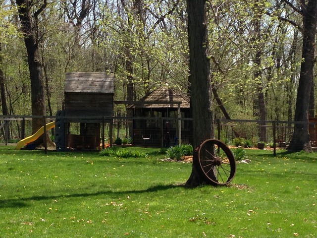 32730 Pleasant Hill Road Genoa, IL 60135 - Photo 16 of 23 a front view of a house with a yard and trees