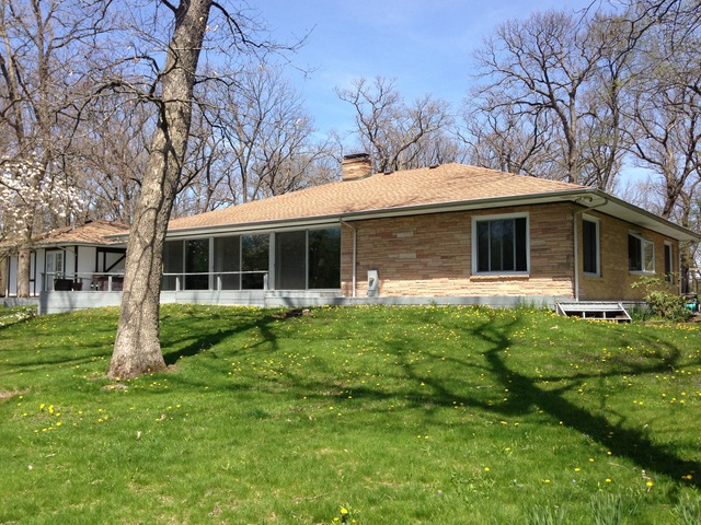 32730 Pleasant Hill Road Genoa, IL 60135 - Photo 21 of 23 a front view of house with yard and green space