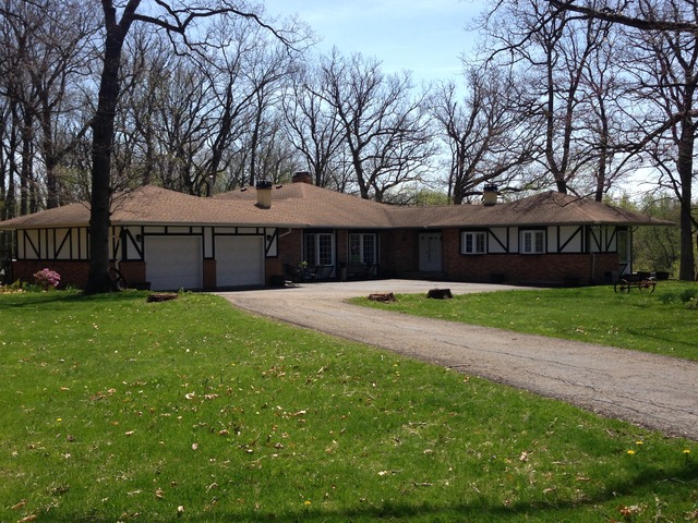 32730 Pleasant Hill Road Genoa, IL 60135 - Photo 23 of 23 a view of a house with a yard