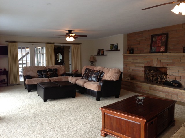 32730 Pleasant Hill Road Genoa, IL 60135 - Photo 5 of 23 a living room with furniture and a fireplace