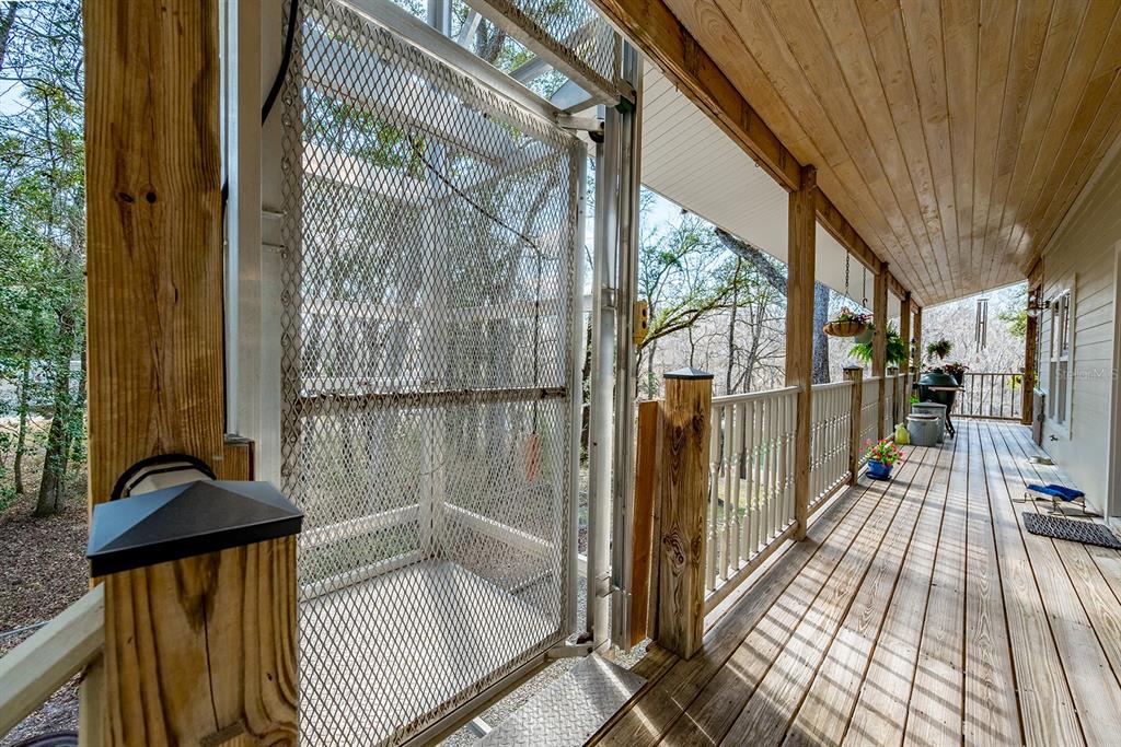498 Southwest Manatee Terrace Fort White, FL 32038 - Photo 16 of 50 a balcony with view of outdoor space