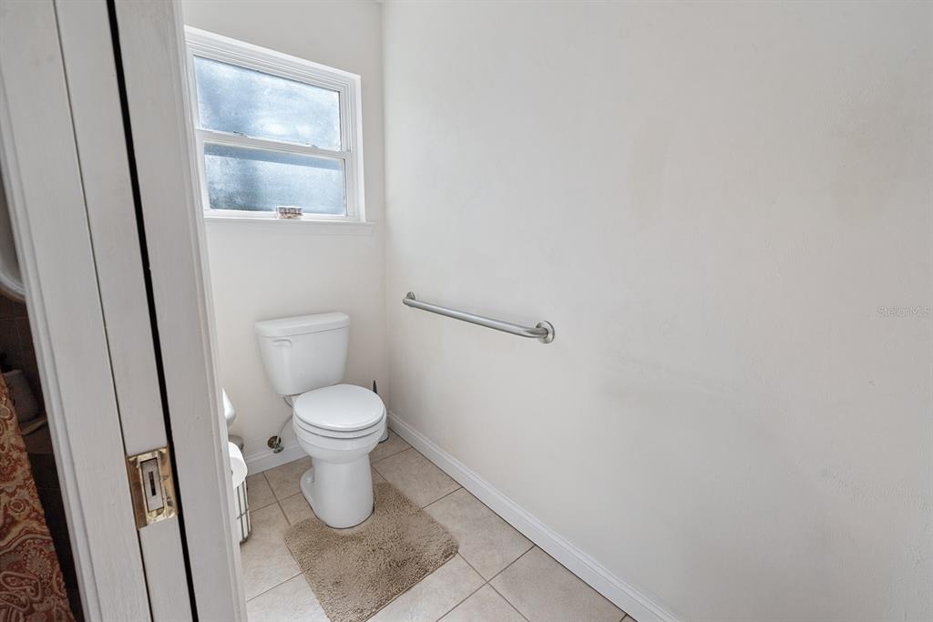 498 Southwest Manatee Terrace Fort White, FL 32038 - Photo 43 of 50 a a bathroom with a toilet