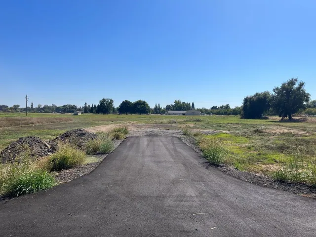 a view of a lake with a big yard