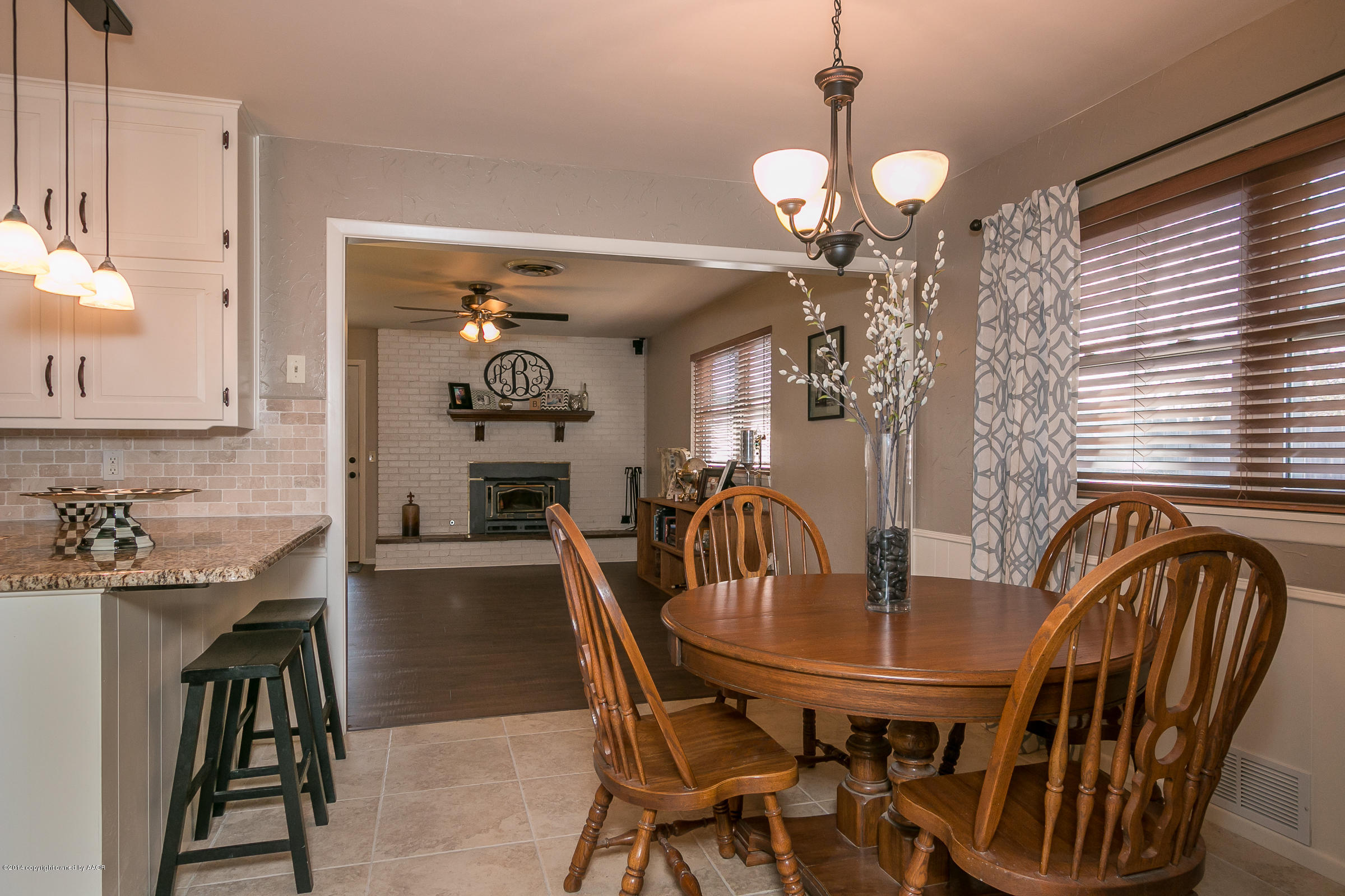 6009 Dreyfuss Road Amarillo, TX 79106 - Photo 10 of 23 a dining room with furniture and window