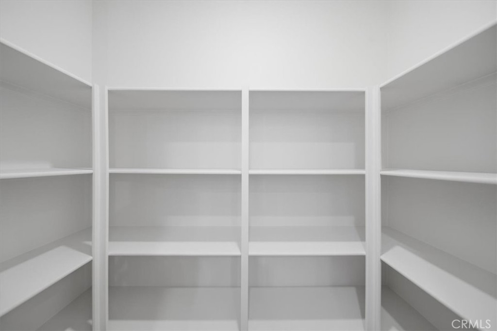 4801 Arroyo Run Moorpark, CA 93021 - Photo 11 of 27 a view of walk in closet with empty racks