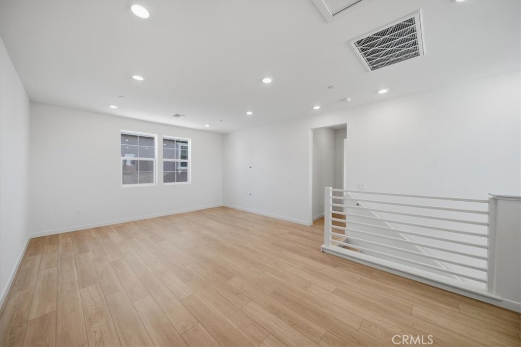 4801 Arroyo Run Moorpark, CA 93021 - Photo 14 of 27 a view of empty room with wooden floor and fan