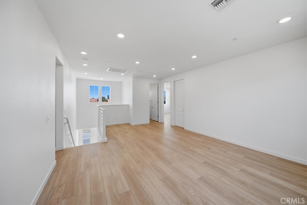 4801 Arroyo Run Moorpark, CA 93021 - Photo 15 of 27 a view of empty room with wooden floor