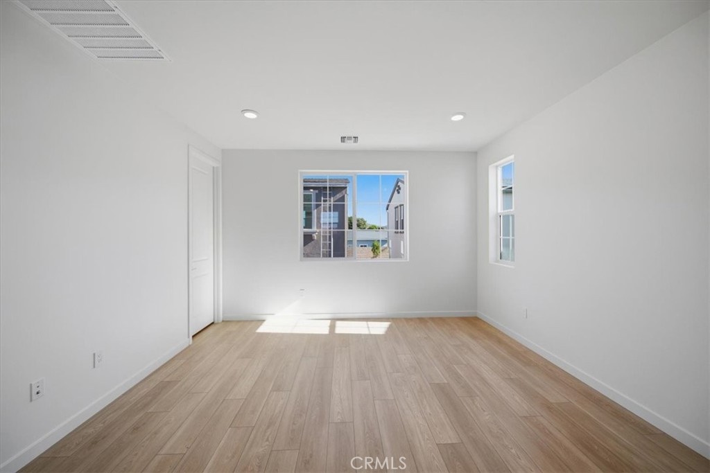 4801 Arroyo Run Moorpark, CA 93021 - Photo 16 of 27 a view of empty room with wooden floor