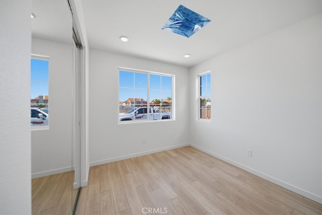 4801 Arroyo Run Moorpark, CA 93021 - Photo 26 of 27 an empty room with a painting on the wall