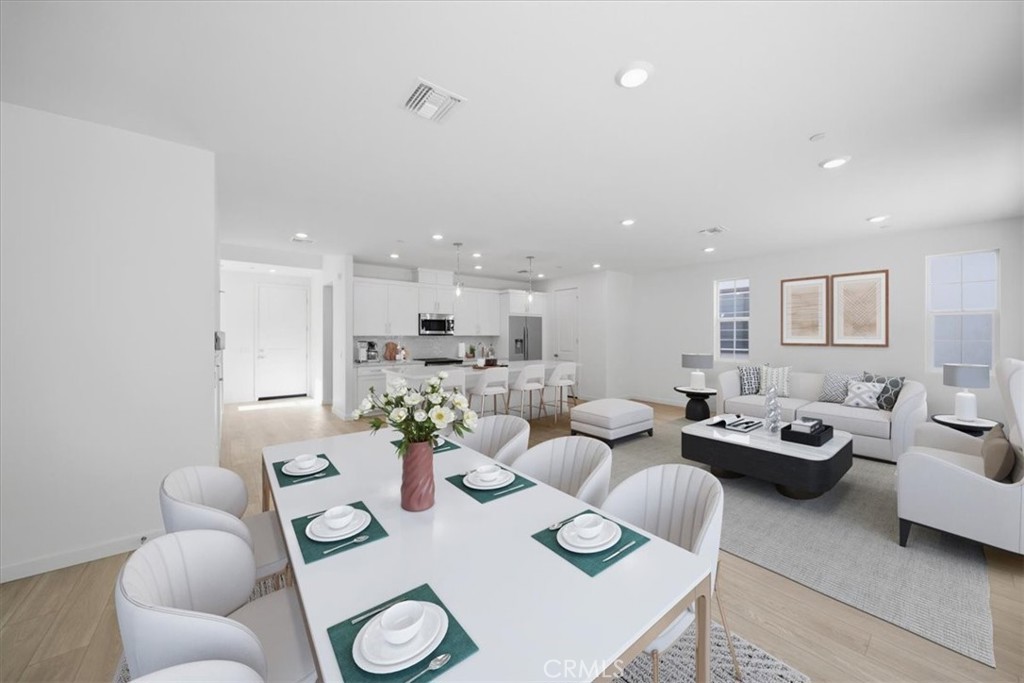 4801 Arroyo Run Moorpark, CA 93021 - Photo 7 of 27 a living room with furniture and wooden floor
