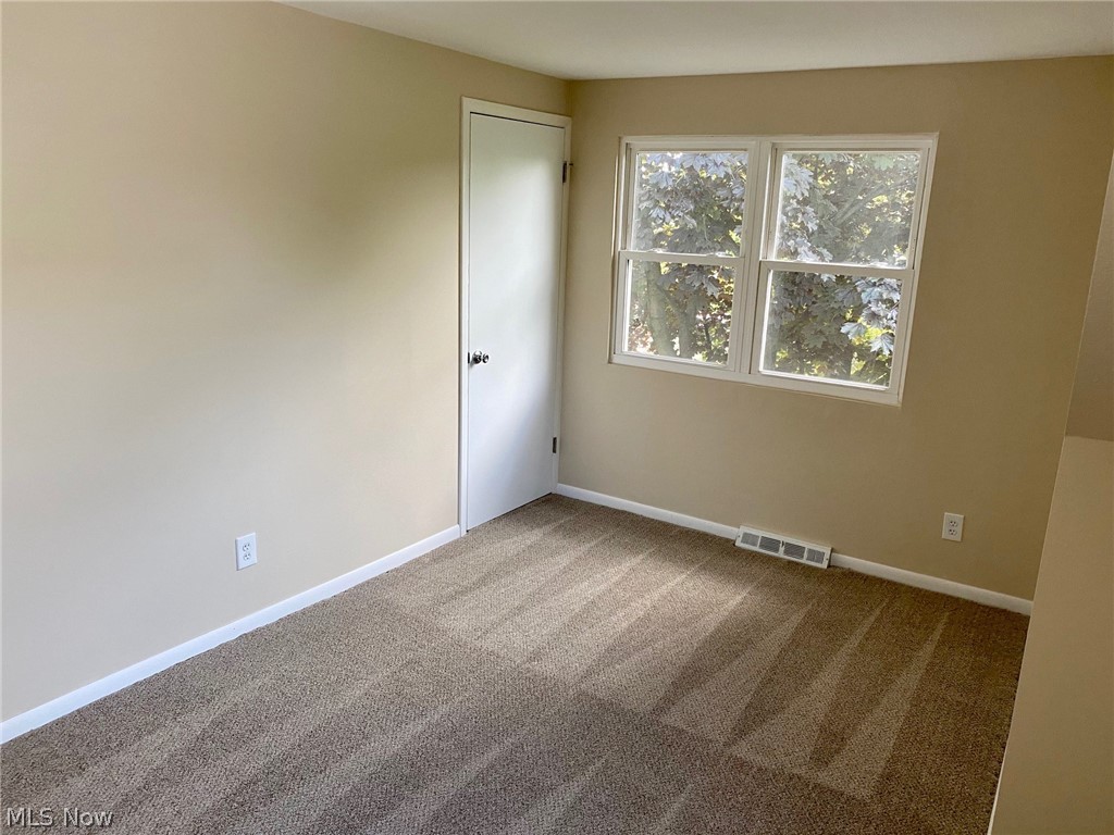 9605 Biddulph Road Cleveland, OH 44144 - Photo 18 of 24 One of three upstairs bedrooms