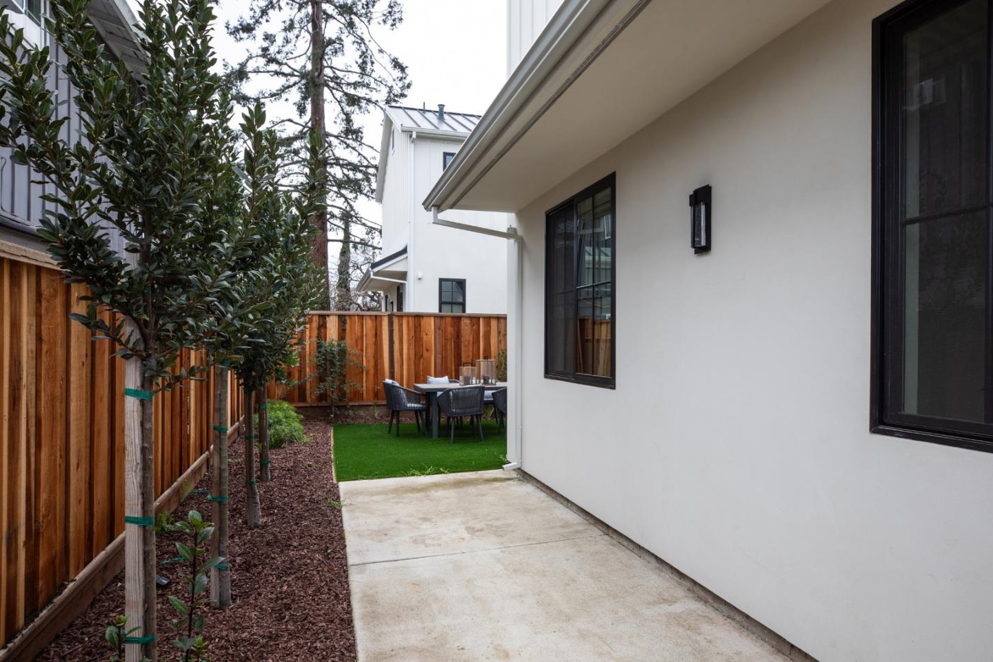 813 Bay Road Menlo Park, CA 94025 - Photo 23 of 23 a view of backyard with small cabin and wooden fence