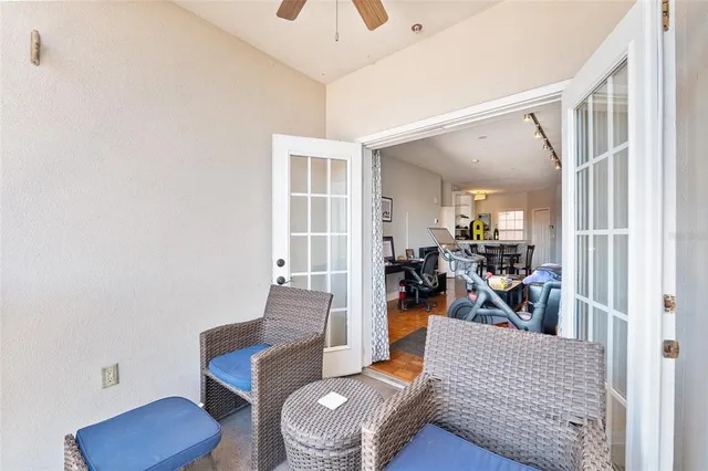 a view of a swimming pool with sitting area