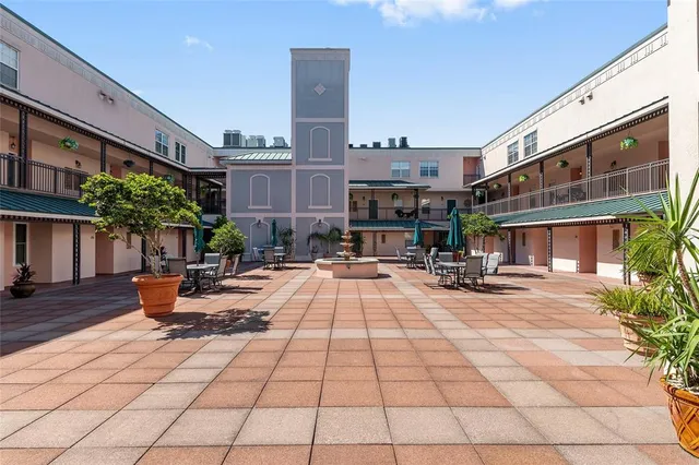 a view of a chairs and tables in the patio