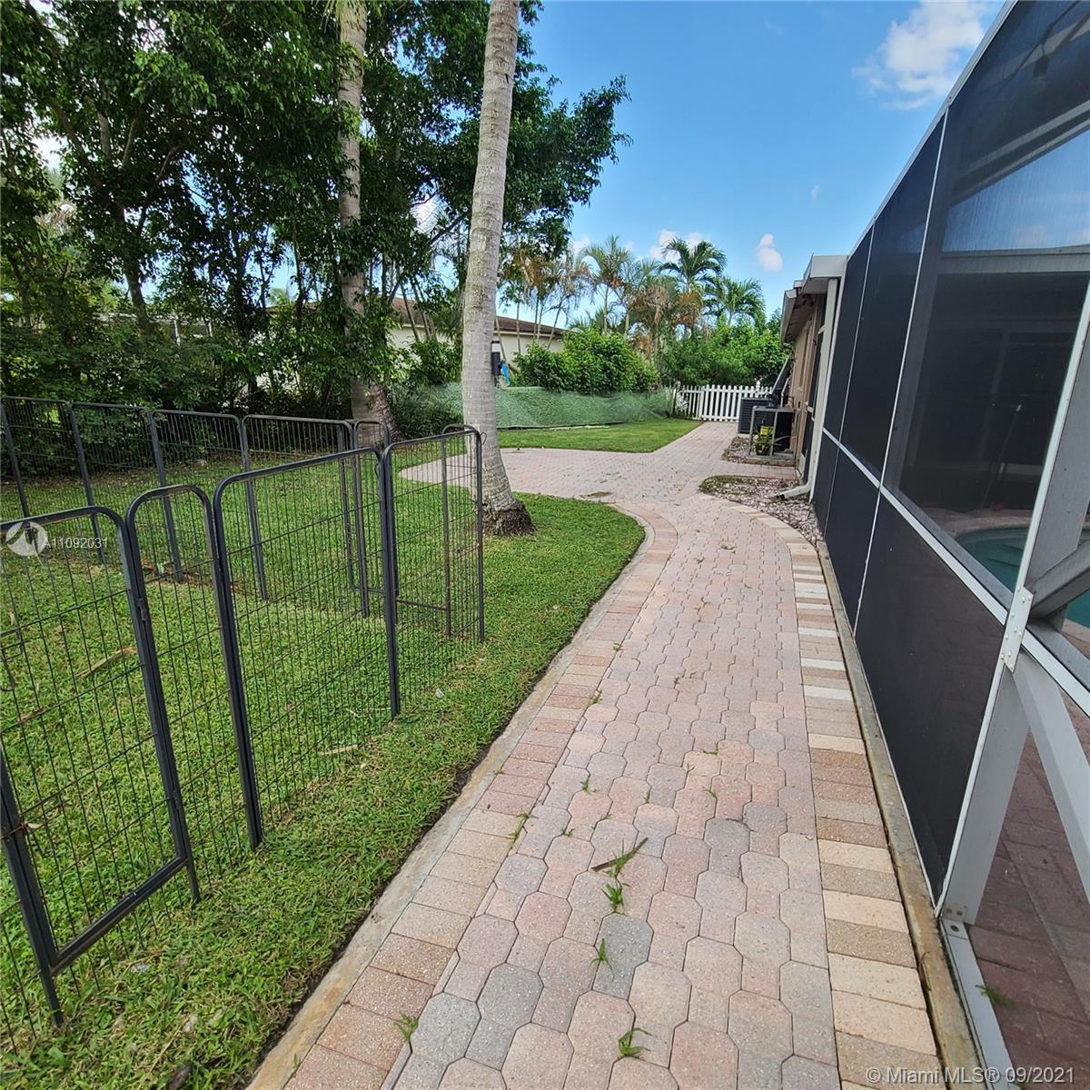 11114 Delta Circle Boca Raton, FL 33428 - Photo 9 of 15 a view of a backyard