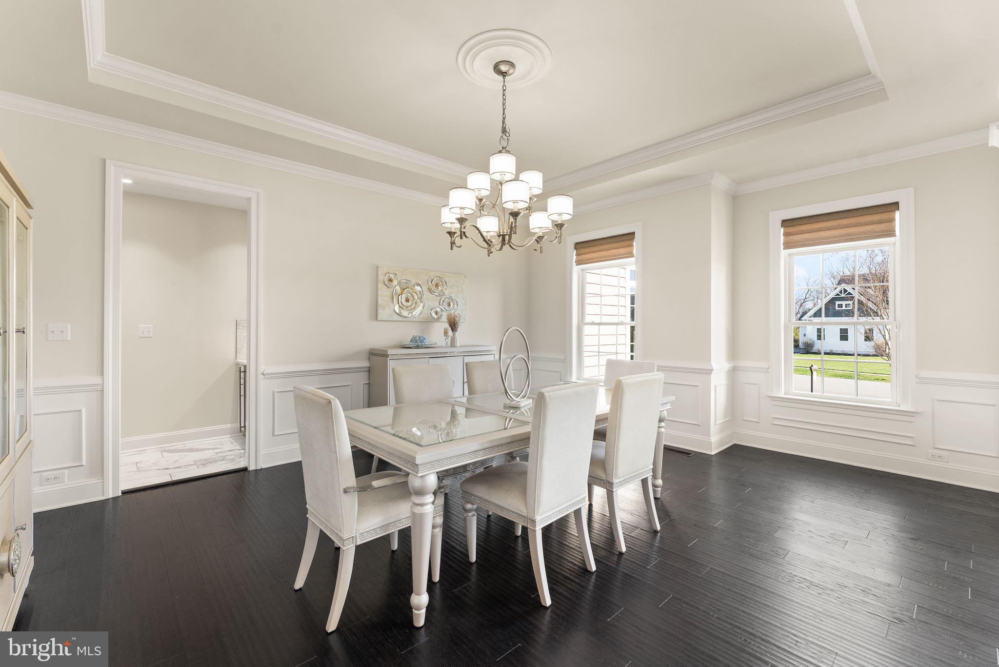 25873 Cameron Walk Place Aldie, VA 20105 - Photo 21 of 92 a view of a dining room with furniture and window