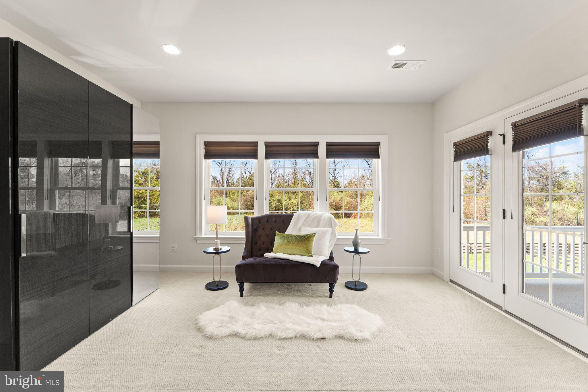 25873 Cameron Walk Place Aldie, VA 20105 - Photo 26 of 92 a living room with furniture and a large window